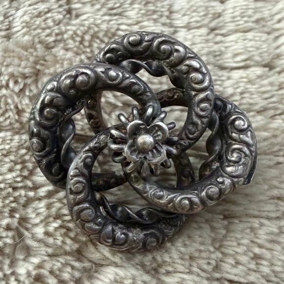 Antique Jewelry - Victorian Sterling Silver Floral Repoussé Lovers Knot Pinwheel Antique Brooch